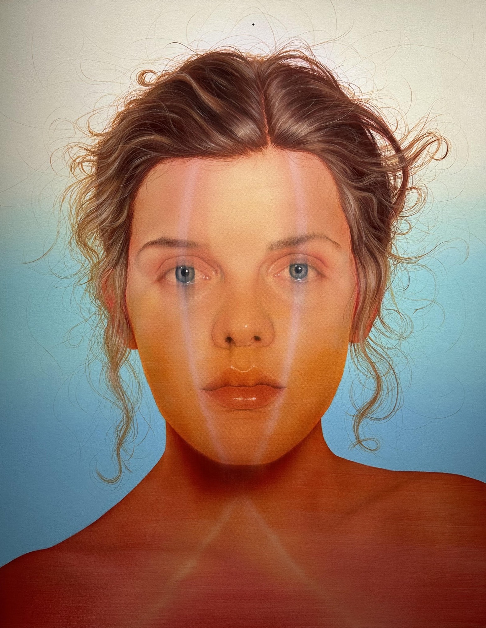 This painting depicts a portrait of woman slightly distorted by a blurry long x shape that extends from the nape of her neck through her eyes to her forehead. This hyperreal portrait features locks of curling light brown hair. The subject has bright blue piecing eyes.